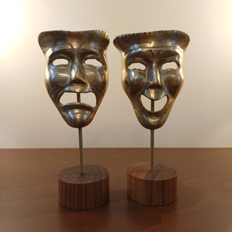 laughing-crying-face-decorative-sculpture.jpg