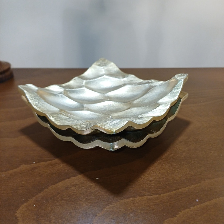 Elegant aluminum dessert plate with a functional rolled edge, showcasing a minimalist and luxurious design.