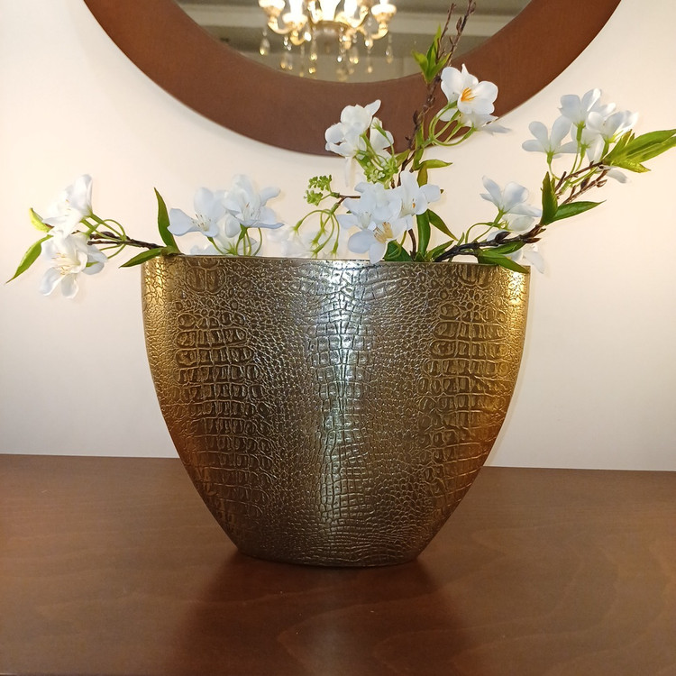 Modern decorative vase made of aluminum with a unique snake-skin style surface and refined finish.