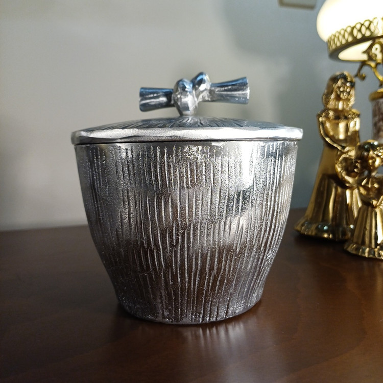 “Aluminum lidded ‘Gereh’ chocolate pot with embossed vertical lines and knot handle. Modern decorative serving ware.”