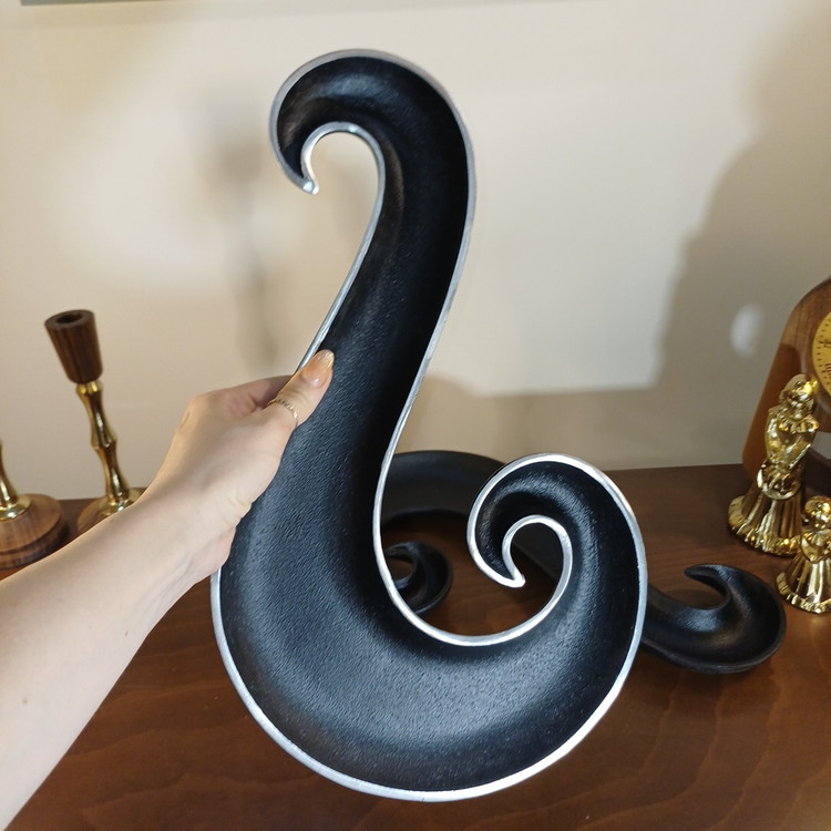 Image 1 Luxury aluminum swan serving bowl displayed on a modern living room coffee table with elegant home decor.