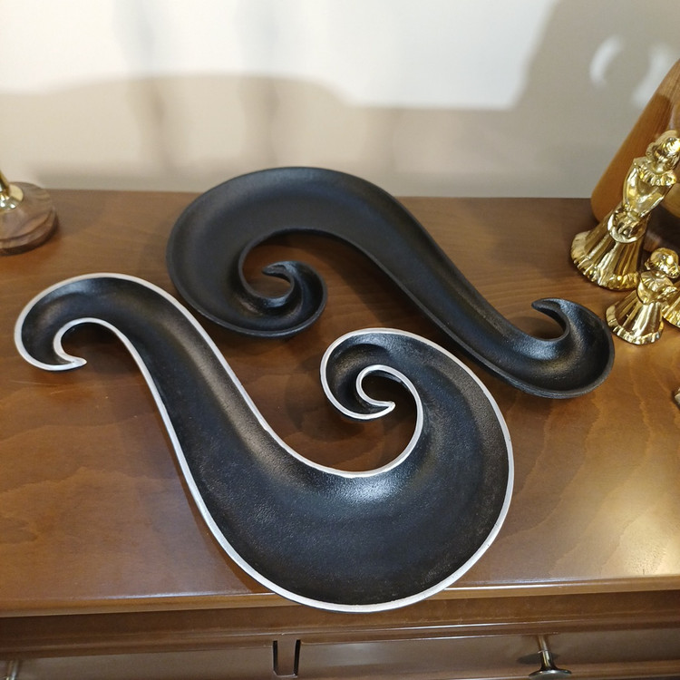 Image 3 Modern aluminum swan serving dish in a warm interior setting, combining functionality and luxury decor.