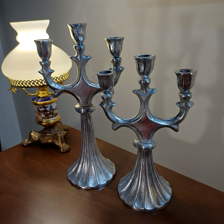 Close-up shot of small Selene 3-lite aluminum candle holder showing premium metal texture