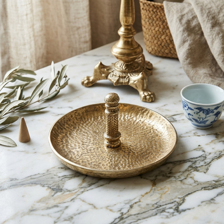 Small round aluminum serving dish with hammered texture